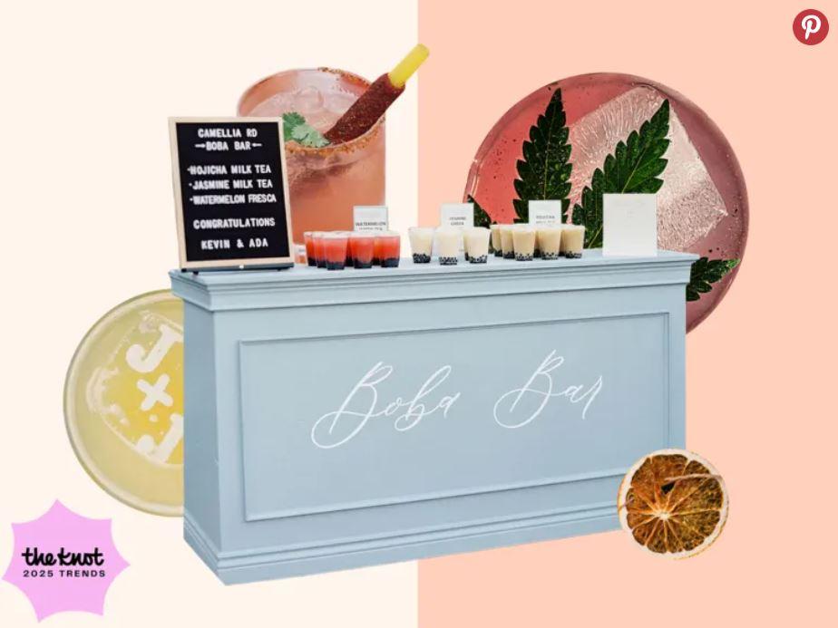 A pastel boba bar setup with drinks and fruit garnishes on a decorative counter.